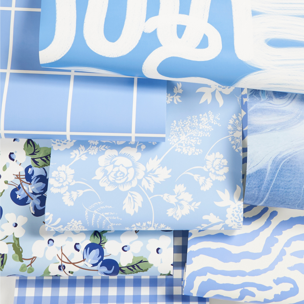 Rolls of blue wallpaper